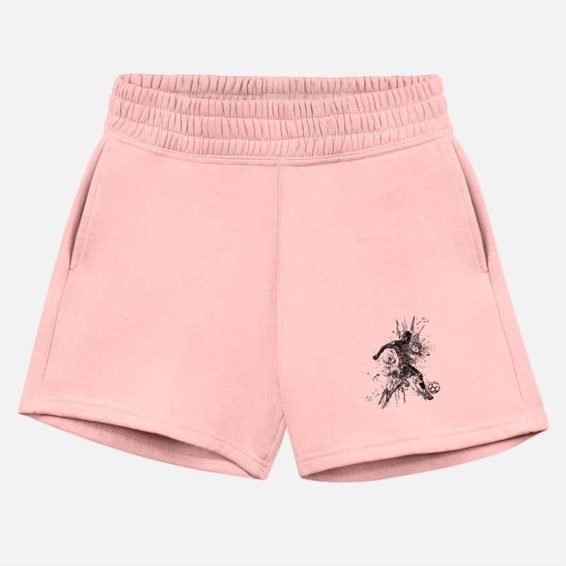 Soccer Player In Splash Kicks A Ball