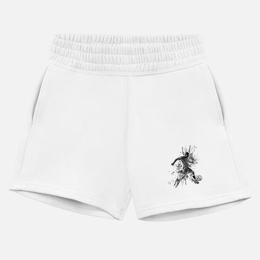 Soccer Player In Splash Kicks A Ball